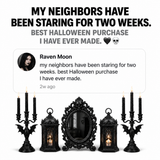Gothic black candlesticks and candelabras in styled dark room