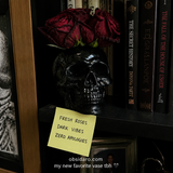 Skull Rose Vase with red roses dark gothic bookshelf lifestyle