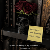 Skull rose vase dark academia bookshelf lifestyle photo